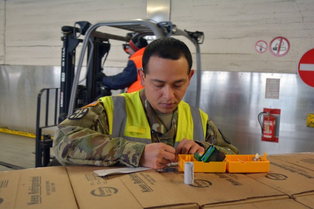 Staff Sgt. Carlos Castillo checks the temperature readout of a new food shipment.  He currently serves as the Public Health Command Europe’s Sexual Assault and Sexual Harassment Lead Victim Advocate as well as Public Health Activity - Rheinland...