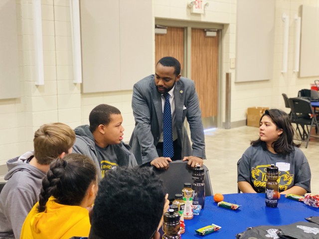 The mayor of Shreveport, La., and U.S. Military Academy Class of 2008 graduate, Adrian Perkins, speaks with a cadet and high school students involved in the Leadership, Ethics and Diversity in Science, Technology, Engineering and Math in Shreveport last weekend. Bringing LEADS to Shreveport was Perkins’ chance to bring together two major parts of his life—West Point and his community—in the hopes they could impact each other positively.