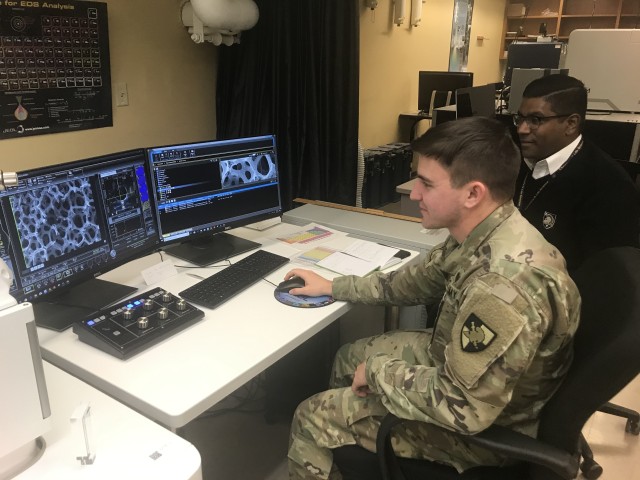 Class of 2020 Cadet Matthew Dibiase, a Chemical Engineering major, and Dr. Enoch Nagelli use a Scanning Electron Microscope (SEM) to characterize fuel cell nickel-alloy catalyst aerogels.