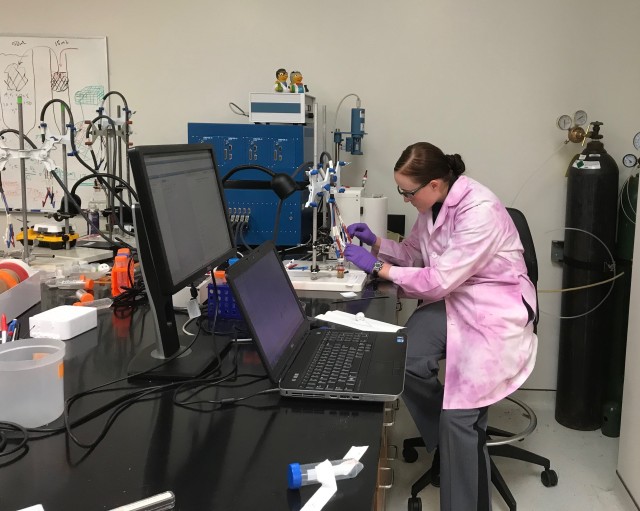 Class of 2021 Cadet Brittany Aikin, a Chemistry major, conducts an electrochemistry experiment as part of her research project on nanomaterials.