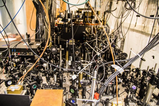 A U.S. Army project conducted at Penn State discovered that a class of particles known as bosons can behave as an opposite class of particles called fermions, when forced into a line. This finding provides a key insights for the development of quantum devices and quantum computers. Researchers at Penn State use this apparatus to create an array of ultra-cold one-dimensional gases made up of atoms.