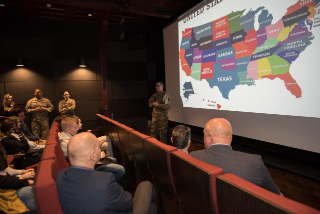 Fishers, Indiana native, Lt. David Hantz, Headquarters and Headquarters Company, 13th Expeditionary Sustainment Command, speaks with high school students March 9. Soldiers from HHC, 13th ESC, participated in a community outreach tour in Pruszcz,...