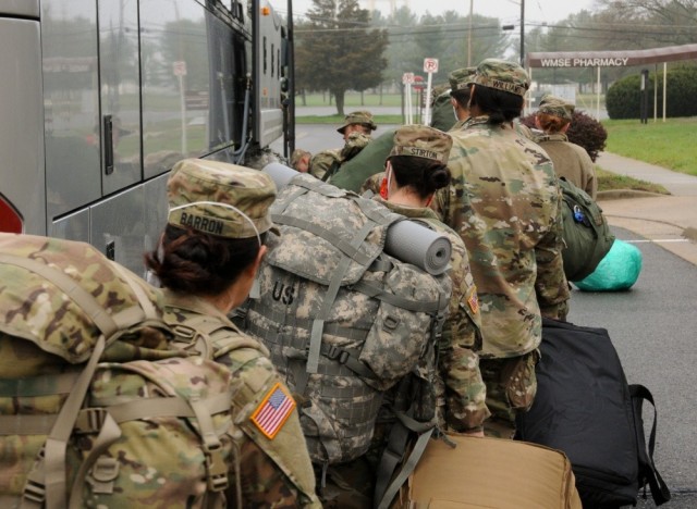 U.S. Army Reserve Urban Augmentation Medical Task Force Soldiers board buses at Joint Base McGuire-Dix-Lakehurst, New Jersey, to deploy to locations across the area, April 08, 2020. Soldiers from the Army Reserve’s 3rd Medical Command, headquartered in Forest Park, Georgia, and 807th Medical Command, headquartered at Fort Douglas, Utah, were selected to form the new UAMTFs. 