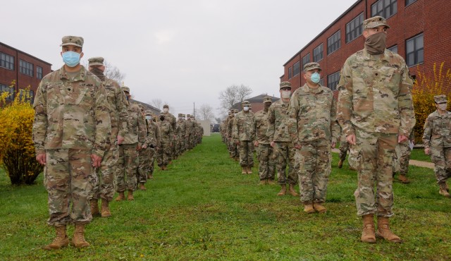 U.S. Army Reserve Urban Augmentation Medical Task Force Soldiers prepare to board buses at Joint Base McGuire-Dix-Lakehurst, New Jersey, and deploy to locations across the New York area, April 08, 2020. Soldiers from the Army Reserve’s 3rd...