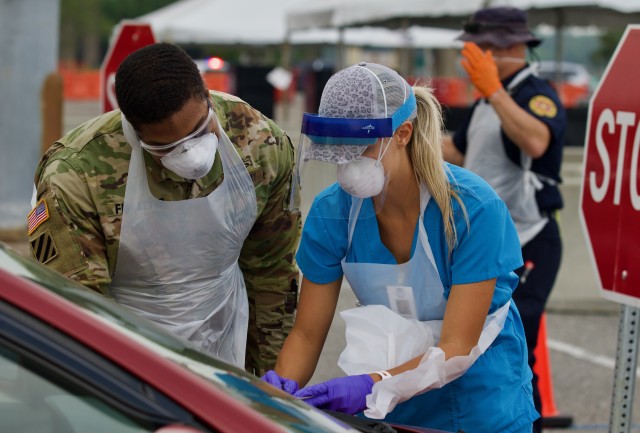 FLNG Soldiers take over Jacksonville drive-thru test site