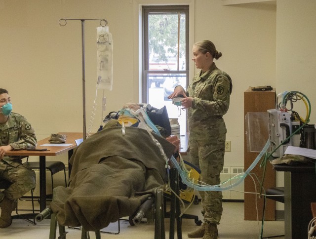 Capt. Cornelia Willis, a nurse with C Company, 210th Brigade Support Battalion, 2nd Brigade Combat Team, 10th Mountain Division (LI) and an instructor, discusses the different oxygen augmentations and ventilators used in hospital environments in a nurse clinical training day at Medical Simulation Training Center, Fort Drum, N.Y, on April 9th, 2020. The training day provided additional training for medics in areas they may not be familiar with, and to provide skills that are outside their scope of practice but may need to perform in an emergency situation.