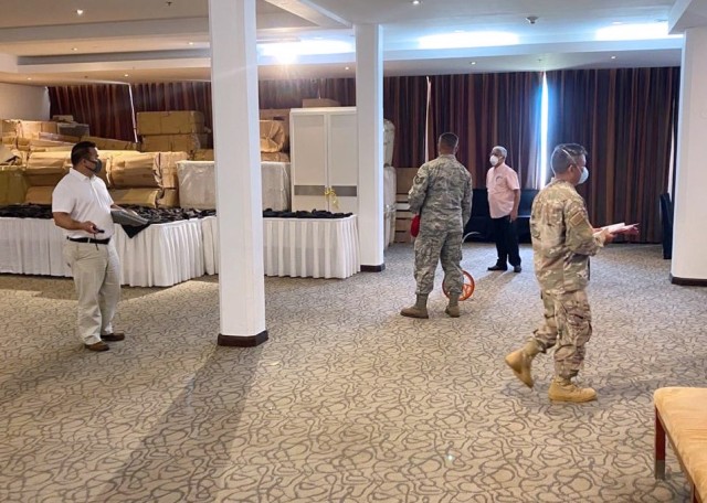 TUMON, GUAM (April 13, 2020) -- Engineering assessment teams from Naval Facilities Engineering Command (NAVFAC) Marianas and the Guam Air National Guard conduct a walkthrough of a hotel located in Tumon as part of the Hotel to Healthcare...