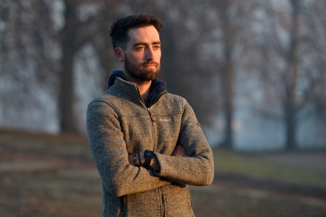 U.S. Navy veteran Dustin Johnson collects his thoughts before departing on a run from Killesberg Park, located in Stuttgart, Germany on January 1, 2020. Mr. Johnson will attempt to run to Berlin, Germany without stopping to rest. The expected time...