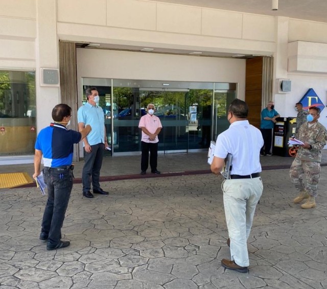 TUMON, GUAM (April 13, 2020) -- Engineering assessment teams from Naval Facilities Engineering Command (NAVFAC) Marianas and the Guam Air National Guard conduct a walkthrough of a hotel located in Tumon as part of the Hotel to Healthcare...