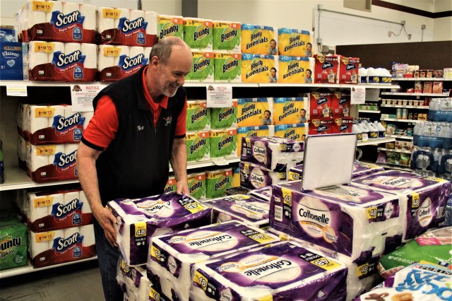 Defense Commissary Agency employee Mike Graham stocks supplies April 3, 2020, at the Fort McCoy (Wis.) Commissary. Since the installation’s response to the COVID-19 pandemic began in March 2020, the Fort McCoy Commissary staff continued to take...