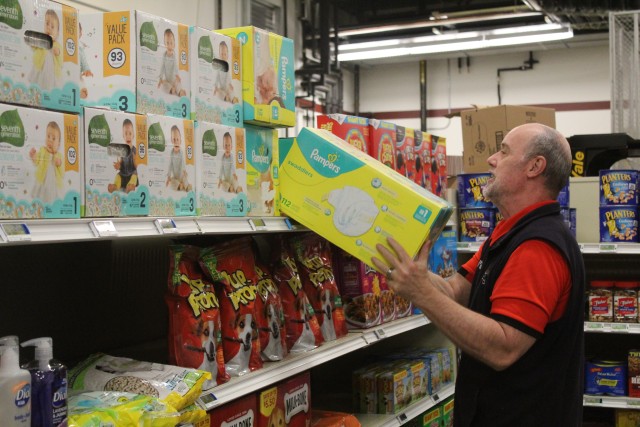 Defense Commissary Agency employee Mike Graham stocks supplies April 3, 2020, at the Fort McCoy (Wis.) Commissary. Since the installation’s response to the COVID-19 pandemic began in March 2020, the Fort McCoy Commissary staff continued to take...