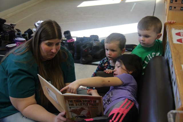 Kim Flock, child and youth program assistant, reads to students March 17, 2020, at the Fort McCoy, Wis., Child Development Center. The CDC is Department of Defense certified and nationally accredited. (U.S. Army photo by Aimee Malone, Public...