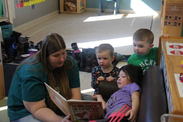 Kim Flock, child and youth program assistant, reads to students March 17, 2020, at the Fort McCoy, Wis., Child Development Center. The CDC is Department of Defense certified and nationally accredited. (U.S. Army photo by Aimee Malone, Public...