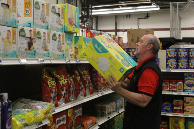 Defense Commissary Agency employee Mike Graham stocks supplies April 3, 2020, at the Fort McCoy (Wis.) Commissary. Since the installation’s response to the COVID-19 pandemic began in March 2020, the Fort McCoy Commissary staff continued to take...