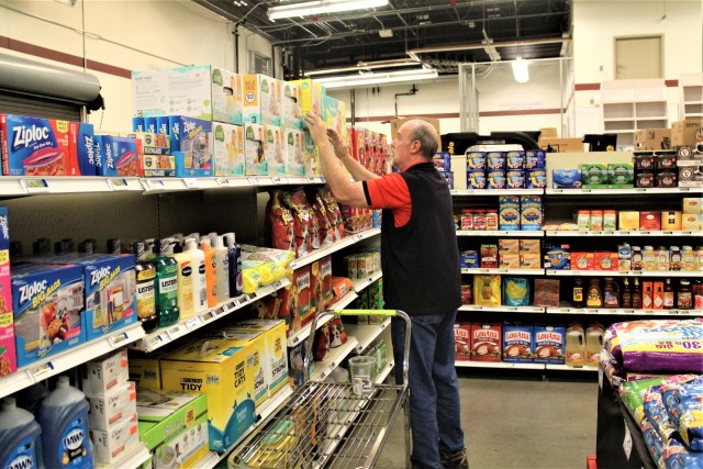 Defense Commissary Agency employee Mike Graham stocks supplies April 3, 2020, at the Fort McCoy (Wis.) Commissary. Since the installation’s response to the COVID-19 pandemic began in March 2020, the Fort McCoy Commissary staff continued to take...