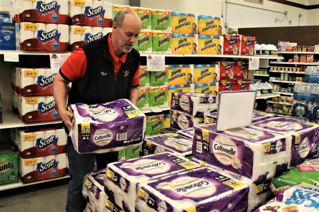 Defense Commissary Agency employee Mike Graham stocks supplies April 3, 2020, at the Fort McCoy (Wis.) Commissary. Since the installation’s response to the COVID-19 pandemic began in March 2020, the Fort McCoy Commissary staff continued to take...