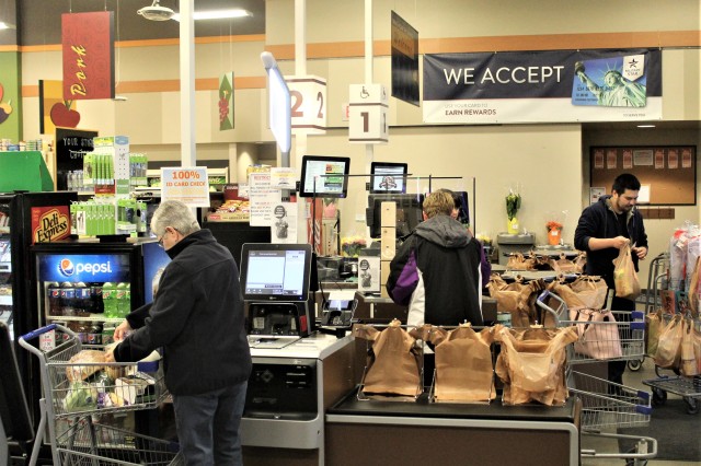 Customers go through checkout lanesApril 3, 2020, at the Fort McCoy Commissary at Fort McCoy, Wis. Since the installation’s response to the COVID-19 pandemic began in March 2020, the Fort McCoy Commissary staff continued to take steps to protect...