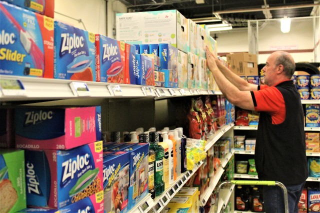 Defense Commissary Agency employee Mike Graham stocks supplies April 3, 2020, at the Fort McCoy (Wis.) Commissary. Since the installation’s response to the COVID-19 pandemic began in March 2020, the Fort McCoy Commissary staff continued to take...