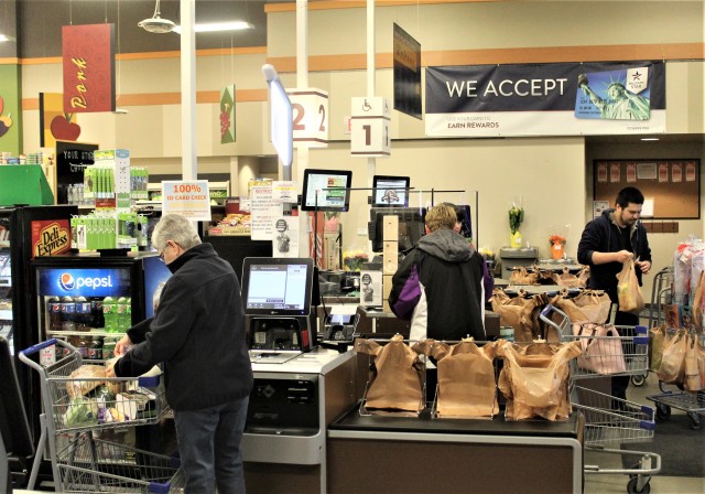 Customers go through checkout lanesApril 3, 2020, at the Fort McCoy Commissary at Fort McCoy, Wis. Since the installation’s response to the COVID-19 pandemic began in March 2020, the Fort McCoy Commissary staff continued to take steps to protect...