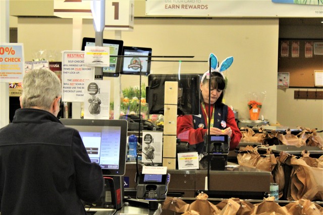 A customer goes through the checkout lane April 3, 2020, at the Fort McCoy Commissary at Fort McCoy, Wis. Since the installation’s response to the COVID-19 pandemic began in March 2020, the Fort McCoy Commissary staff continued to take steps to...