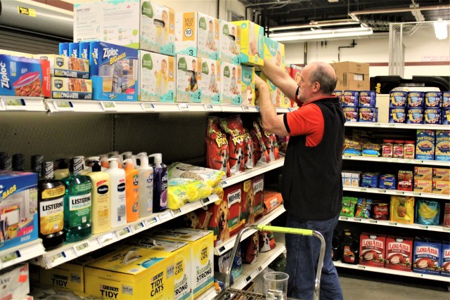 Defense Commissary Agency employee Mike Graham stocks supplies April 3, 2020, at the Fort McCoy (Wis.) Commissary. Since the installation’s response to the COVID-19 pandemic began in March 2020, the Fort McCoy Commissary staff continued to take...