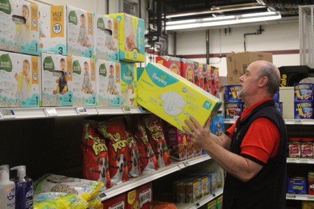 Defense Commissary Agency employee Mike Graham stocks supplies April 3, 2020, at the Fort McCoy (Wis.) Commissary. Since the installation’s response to the COVID-19 pandemic began in March 2020, the Fort McCoy Commissary staff continued to take...