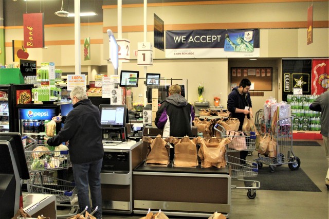 Customers go through checkout lanesApril 3, 2020, at the Fort McCoy Commissary at Fort McCoy, Wis. Since the installation’s response to the COVID-19 pandemic began in March 2020, the Fort McCoy Commissary staff continued to take steps to protect...