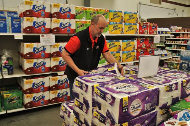 Defense Commissary Agency employee Mike Graham stocks supplies April 3, 2020, at the Fort McCoy (Wis.) Commissary. Since the installation’s response to the COVID-19 pandemic began in March 2020, the Fort McCoy Commissary staff continued to take...
