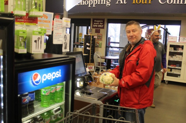 Harry Hughes with the Installation Legal Office at Fort McCoy, Wis., uses a self checkout April 3, 2020, at the Fort McCoy Commissary. Since the installation’s response to the COVID-19 pandemic began in March 2020, the Fort McCoy Commissary...