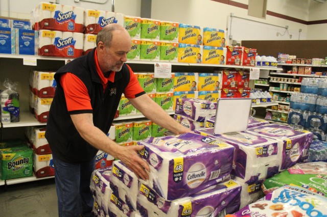 Defense Commissary Agency employee Mike Graham stocks supplies April 3, 2020, at the Fort McCoy (Wis.) Commissary. Since the installation’s response to the COVID-19 pandemic began in March 2020, the Fort McCoy Commissary staff continued to take...