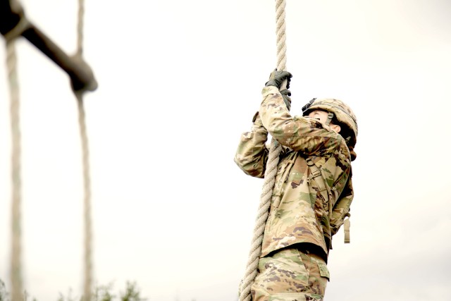 Staff Sgt. Erica Myers climbs a rope during 5th Security Force Assistance Brigade's Assessment and Selection process, Jan. 28, 2020 at Joint Base Lewis McChord, Washington.  The SFAB Assessment and Selection process is a series of rigorous physical and mental tests designed to enable only the best candidates the chance to serve as an Advisor in the SFAB.