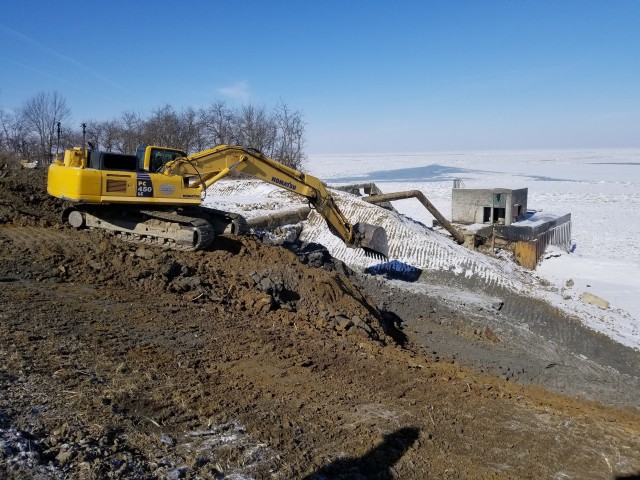 Huffman Equipment Rental, contractor for the U.S. Army Corps of Engineers Buffalo District, builds an access road to the bottom of the Lake County Beach Restoration and Shoreline Protection project site in Painsville County, Ohio, Feb. 28, 2019.
...