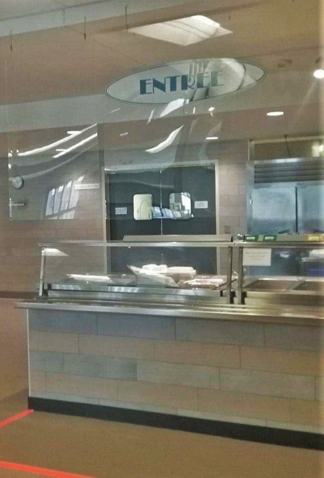 Special protective plexiglass set up as a sneeze barrier in a dining facility is shown April 1, 2020, at Fort McCoy, Wis. The barrier was a protective measure put in place as part of the Fort McCoy response to the COVID-19 pandemic and to still...