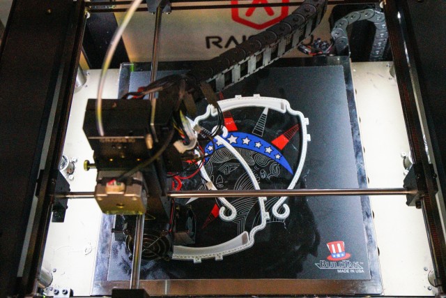 A 3D printer operated by U.S. Army Soldiers with the 18th Field Artillery Brigade, creates components used to assemble face shields at Fort Bragg, N.C., on April 15, during Operation Dragon Mask. Units from across Fort Bragg were repurposed to create face masks, face shields, and other personal protective equipment to be distributed as part of the COVID-19 response. (U.S. Army Photo by Sgt. Liem Huynh)