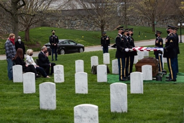 Soldiers assigned to 1st Battalion, 3d U.S. Infantry Regiment (The Old Guard) conduct military funeral honors for U.S. Army Retired Command Sgt. Maj. Robert M. Belch in Section 68 of Arlington National Cemetery, Arlington, Virginia, April 14, 2020. Given current health protection guidance from the Secretary of Defense, Old Guard Soldiers wear face coverings to mitigate the spread of COVID-19 while executing the Memorial Affairs mission.