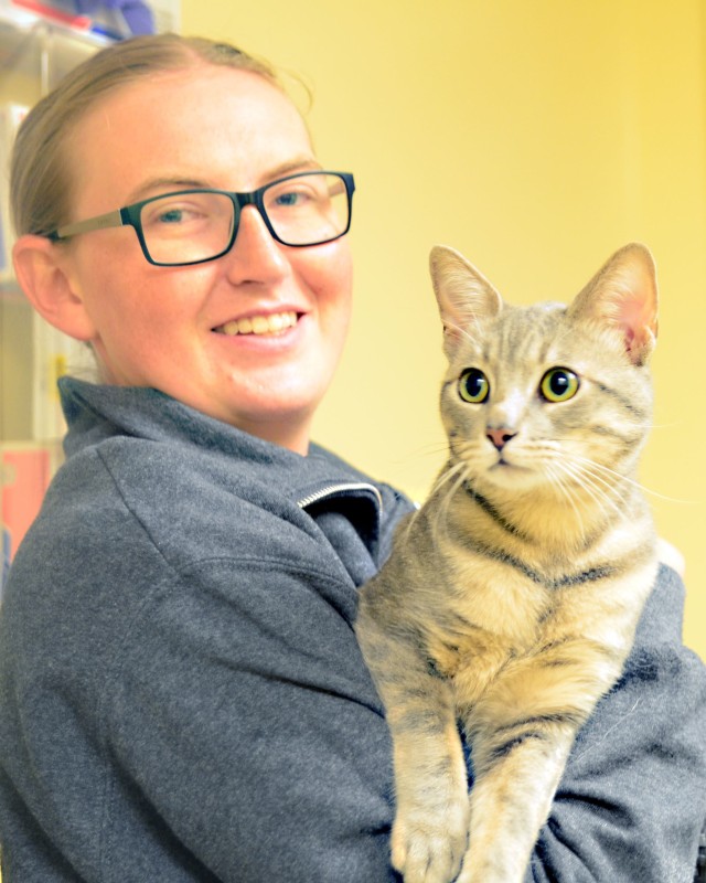 Spc. Carly Stanton, an animal care specialist assigned to the Fort Stewart Veterinary Treatment Facility, holds a cat that is up for adoption at the Fort Stewart Veterinary Treatment Facility on Fort Stewart, Georgia, April 10, 2020. The staff at...