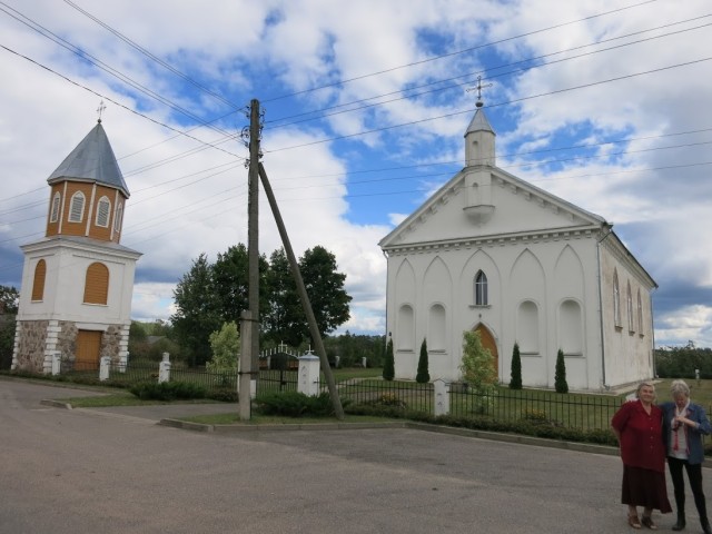 Marija Fine stands to the right of her Aunt Leonora before Andrupene Catholic Church, the church where her parents were married in 1940 and she was christened in 1943. With the assistance of a researcher from the American Latvian Association, Fine...