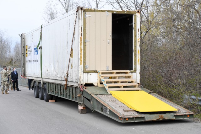 Secretary of the Army Ryan D. McCarthy and Vice Chief of Staff of the Army Gen. Joseph M. Martin visit the Michigan National Guard armory in Taylor, Mich., April. 22, 2020. Called the Mobile Thermal Utility Sanitizer, the large trailer-type unit...