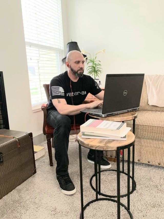 Ferdinand Detres, public affairs specialist with U.S. Army Corps of Engineers, Omaha District, teleworks from home April 23 during the COVID-19 pandemic. (photo by: Kylie Young)