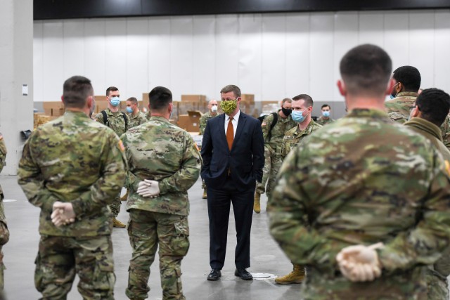 Secretary of the Army Ryan D. McCarthy, center, and Vice Chief of Staff of the Army Gen. Joseph M. Martin visit the TCF Center in Detroit, Mich., April 22, 2020.
