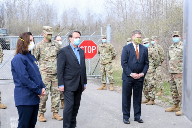 Secretary of the Army Ryan D. McCarthy, right, and Vice Chief of Staff of the Army Gen. Joseph M. Martin, left, visit the Michigan National Guard armory in Taylor, Mich., April. 22, 2020.