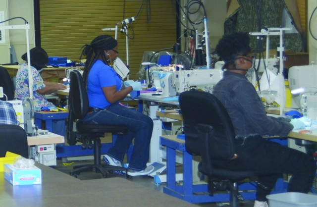 Pine Bluff Arsenal textile production workers with the Directorate of Chemical and Biological Defense Operations are hard at work making cloth face coverings.