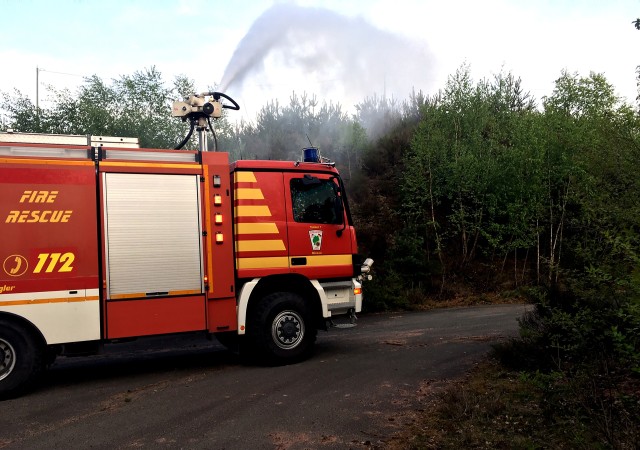 A tanker truck from the U.S. Army Garrison Rheinland-Pfalz Station 3 at Miesau Army Depot provides mutual aid to local German volunteer fire departments during a forest fire that burned approximately 125,000 sq. meters of scrub and natural debris...