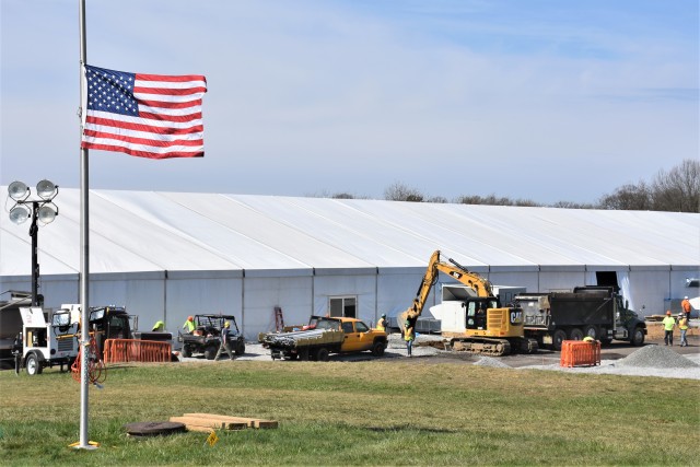 One of four climate-controlled temporary hospital units being constructed on the athletic fields at the State University of New York at Old Westbury, New York.  