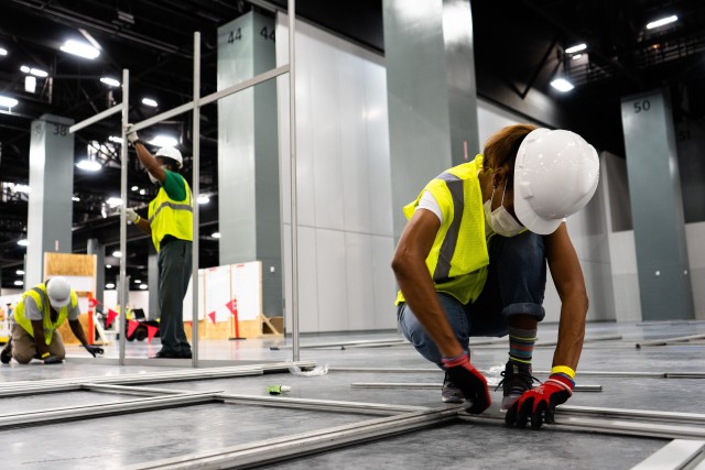 The Miami Beach Convention Center is now a 24 hour construction site crews work at a steady pace to install ICU and Acute Care pods....