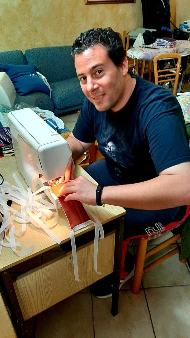Giulio Rigodanzo, a specialist in U.S Army Garrison's directorate of human resources spent time in home quarantine last week sewing 100 protective masks for his American colleagues and customers.  Rigodanzo learned from a garrison town hall that some American families missed the distribution of free protective masks by local Veneto region communities and he wanted to do something to show Italians do care for the Army families here.  He found material at his house and began sewing.  His masks were provided to the garrison's Central Processing Facility and Army Community Service.  (Contributed photo)