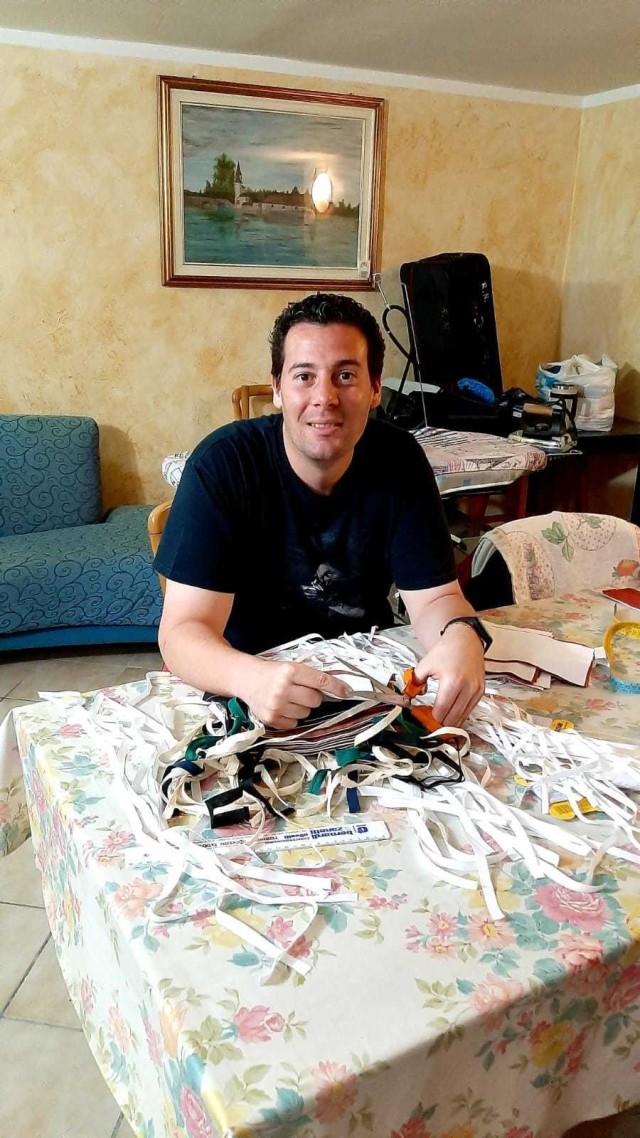 Giulio Rigodanzo, a specialist in U.S Army Garrison's directorate of human resources spent time in home quarantine last week sewing 100 protective masks for his American colleagues and customers.  Rigodanzo learned from a garrison town hall that...