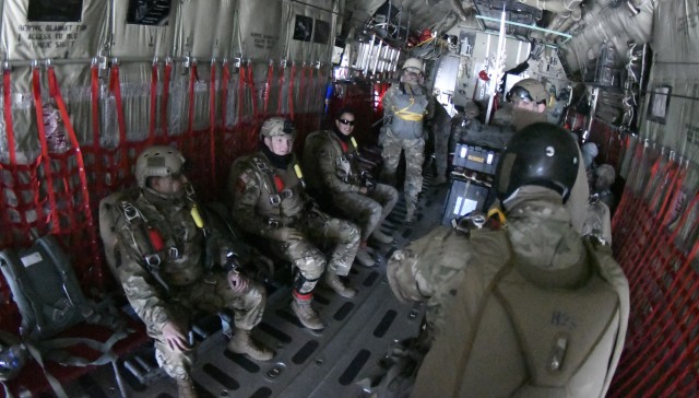 Cadre assigned to the Quartermaster School's Aerial Delivery and Field Services Department situate themselves on the aircraft during an airborne operation April 22 at Fort Pickett, the first since COVID-19 concerns shutdown airborne activities there.