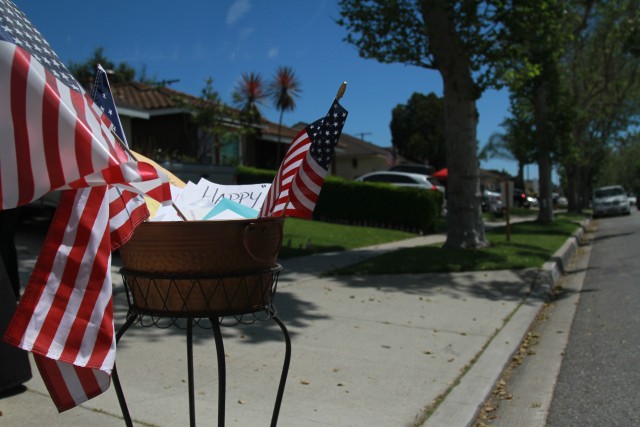 Birthday cards are displayed front of the home of World War II veteran, Lt. Col. Sam Sachs, wishing him a happy 105th birthday, in Lakewood, Calif., on April 26, 2020.  The retired Army officer received 6,200 cards from all over the world for his birthday. 