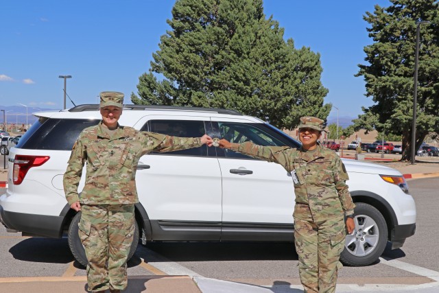 Maj. Gen. Laura A Potter, Commanding General U.S. Army Intelligence Center of Excellence and Fort Huachuca presents a coin to Raymond W. Bliss Army Health Center Soldier,
Spc. Cynthia A. Herrera. Herrera received the coin in recognition of her self-motivation to learn sign language in order to ask the screening questions to a hearing impaired RWBAHC team member.